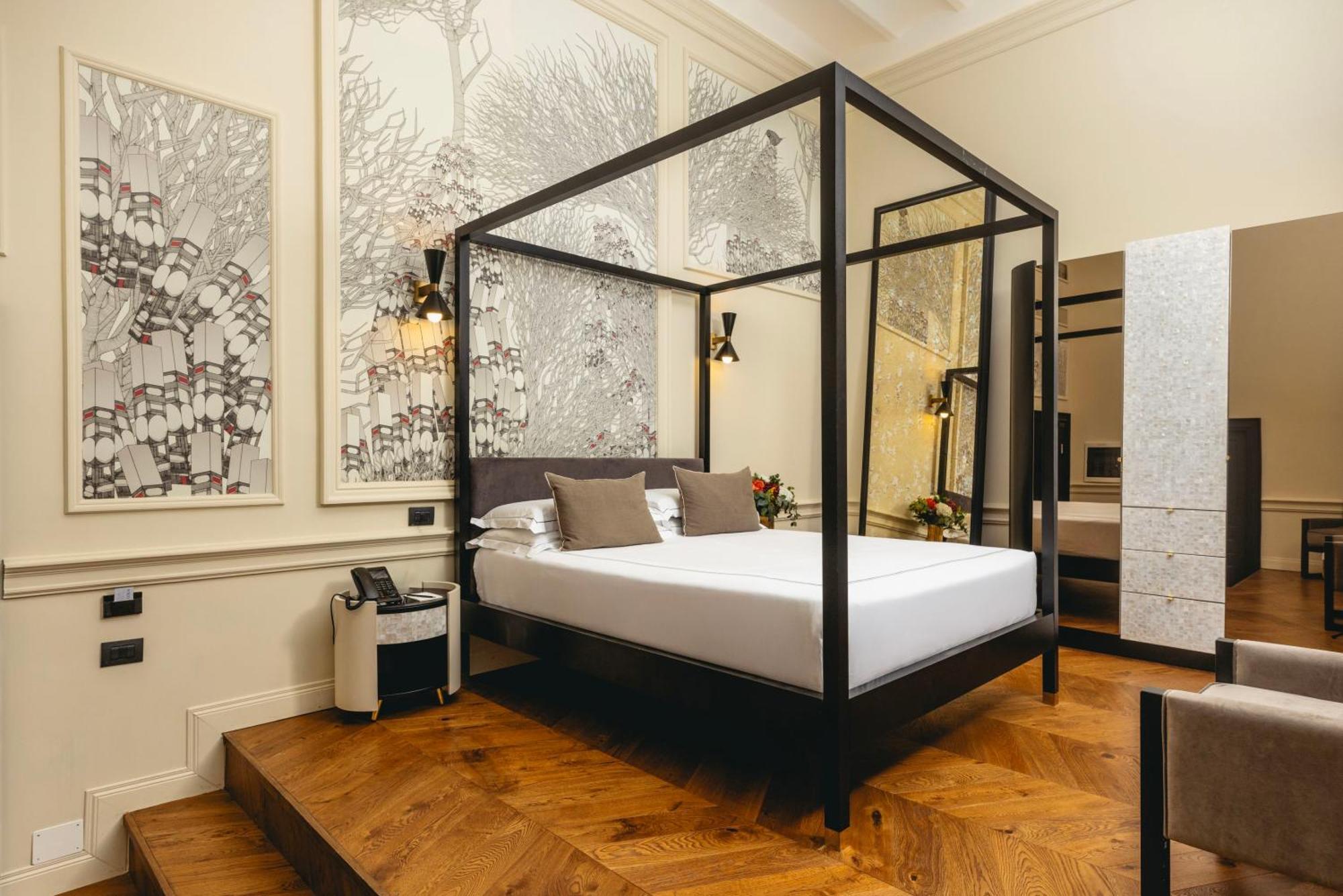 Roma Luxus Hotel Εξωτερικό φωτογραφία A bedroom at the hotel